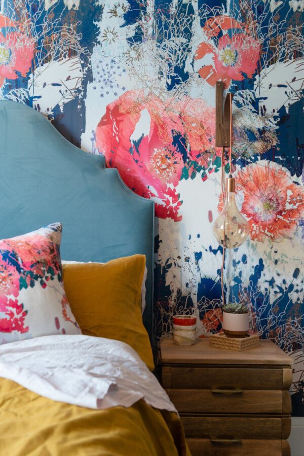Close-Up Detail: "Close-up of Poppy Cloud wallpaper showcasing delicate poppies and soft, airy tones of red and white."