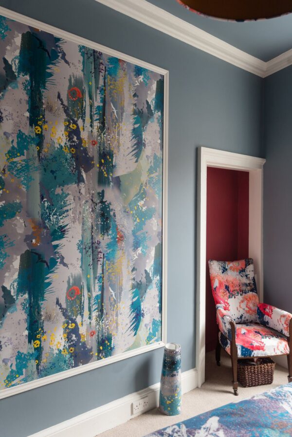 Room Setting: "Living room with Tern of the Tides wallpaper, creating a serene coastal atmosphere with light furniture and ocean-inspired tones."